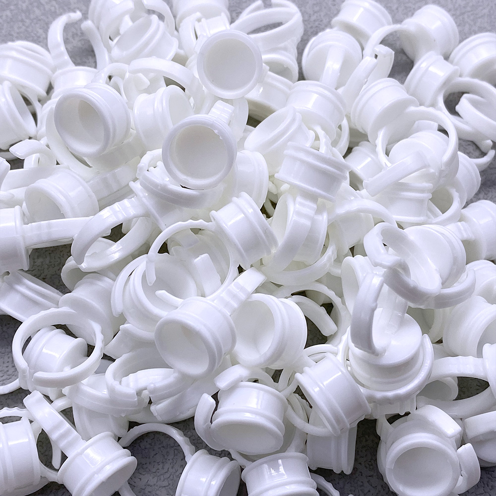 100 Stuks Wegwerp Lijm Ring Cu - Body Jewelry Tattoo recensie en prijs