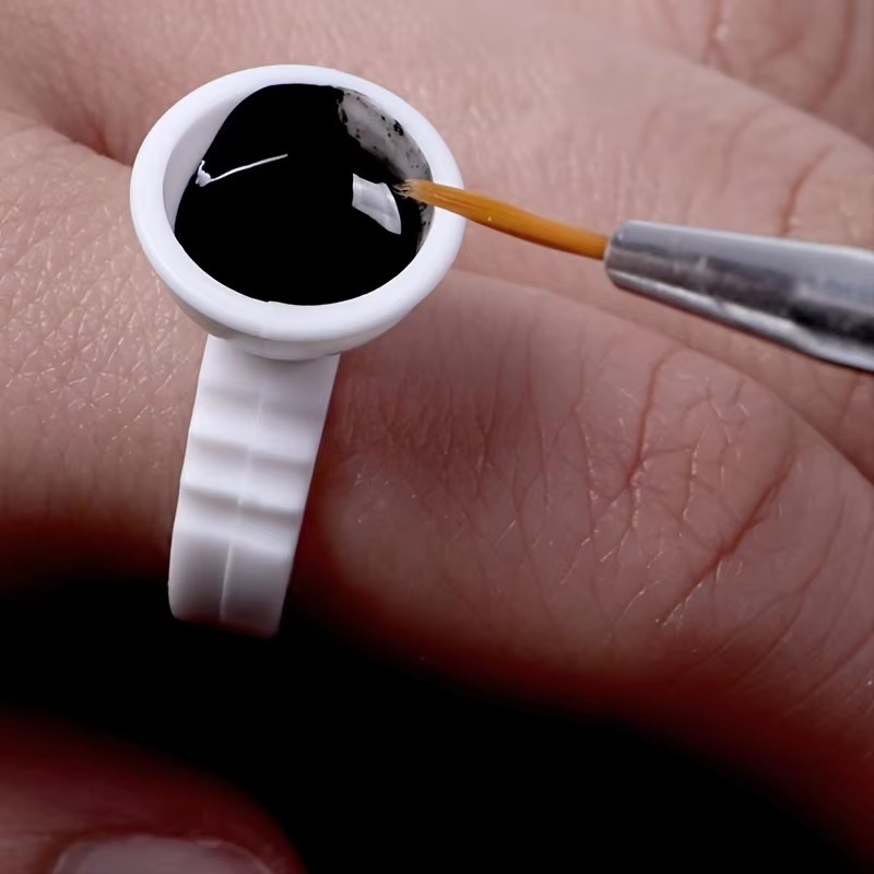 100 wegwerp witte lijmhouderri - Body Jewelry Tattoo recensie en prijs